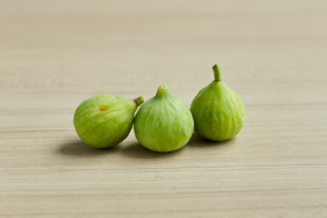 Ripe figs on a on a wooden table