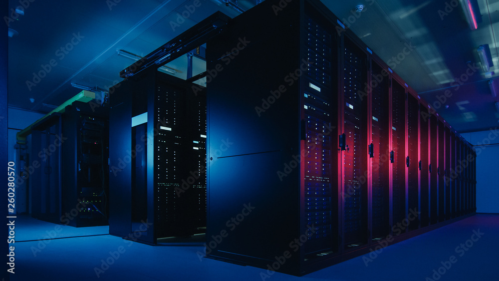 Poster Shot of Data Center With Multiple Rows of Fully Operational Server Racks. Modern Telecommunications, Cloud Computing, Artificial Intelligence, Database. Shot in Dark with Neon Blue, Pink Lights.