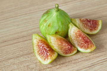 Ripe figs on a on a wooden table