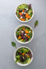 Baked beet and carrot salad with cheese