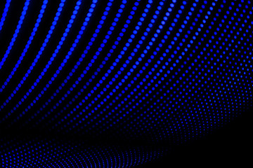 Abstract lines of blue color. Painting made with light. Abstract pattern of lines formed by points.