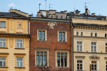 Fototapeta premium Front of tenements at the Main Market Square in Krakow, Poland