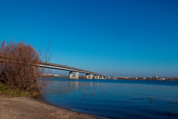 Autumn day in Arkhangelsk. View of the river Northern Dvina and automobile bridge in Arkhangelsk.