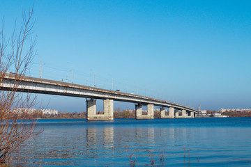 Autumn day in Arkhangelsk. View of the river Northern Dvina and automobile bridge in Arkhangelsk.