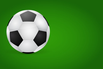 Soccer ball on green background