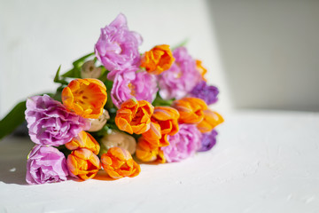 Bouquete of colorful spring tulips in a sunny day