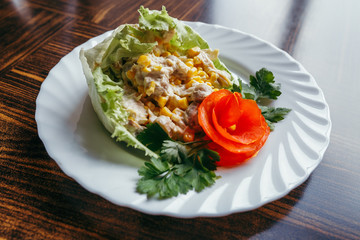 Fresh healthy salad in bowl and ingredients