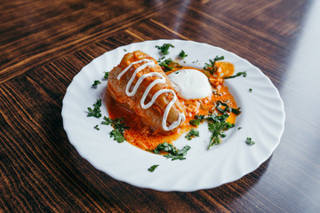 Stuffed cabbage leaves with meat, rice and vegetables. Chou farci, dolma, sarma, sarmale, golubtsy or golabki - popular dish in many countries.