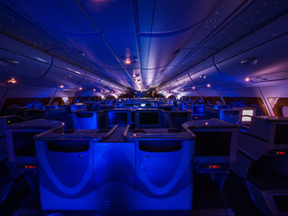Business class cabin of Airbus A380 in Emirates Airline - obrazy, fototapety, plakaty