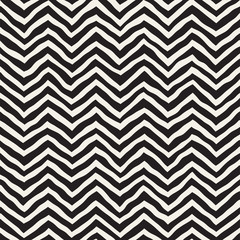 Seamless geometric vector pattern. Monochrome black and white brush strokes background. Hand drawn zigzag lines texture.