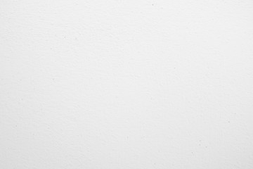 White textured wall background.