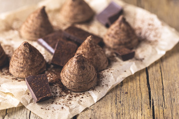 Homemade Tasty Chocolate Truffle Candy on the Old Wooden Background Tasty Dessert Horizontal Toned