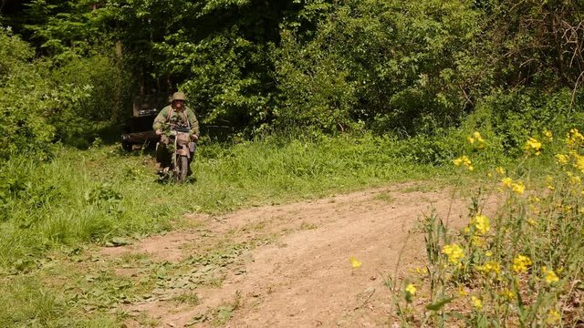 WW2 &ndash; German SS captures US Jeep are leaving a forest