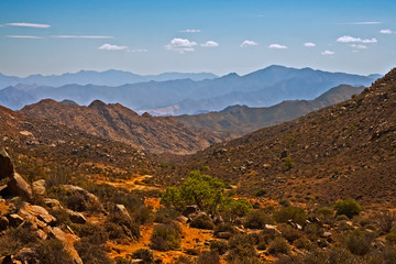 Fototapeta na wymiar Rugged Valley with distant hills