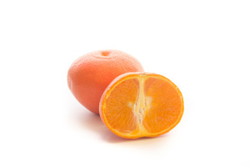 Fresh orange fruit with sliced half of orange isolated on the white background.