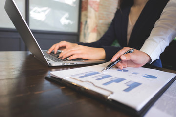 Woman talking with colleague about new startup project.Business people brainstorming concept.
