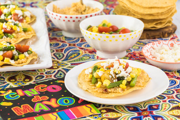 Mexican food. Veggie corn tostadas with caulflower mash.