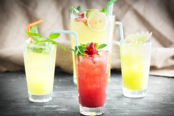Group of lemonade glasses and pitcher
