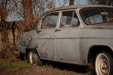 Photo of one old car in the village