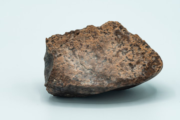 Chondrite Meteorite isolated, a piece of rock formed in outer space in the early stages of Solar...