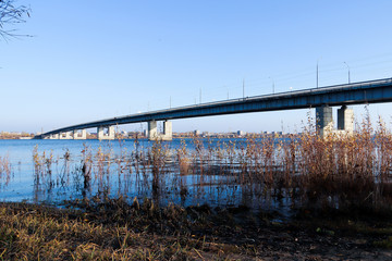 Autumn day in Arkhangelsk. View of the river Northern Dvina and automobile bridge in Arkhangelsk.