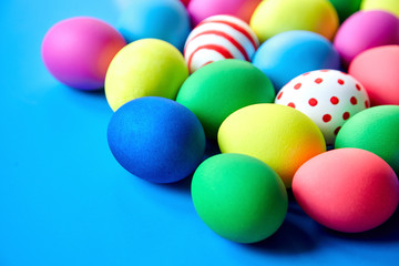 Colorful Easter eggs on blue background