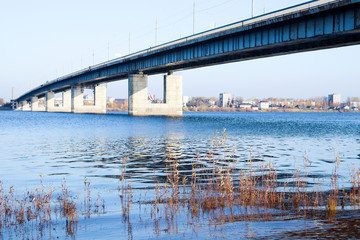 Autumn day in Arkhangelsk. View of the river Northern Dvina and automobile bridge in Arkhangelsk.