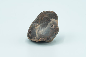 Chondrite Meteorite isolated, a piece of rock formed in outer space in the early stages of Solar...