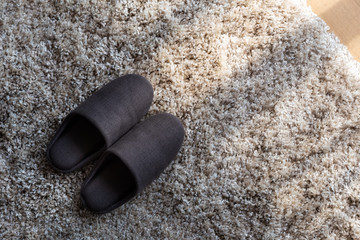 slippers on mat