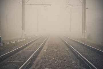 Obraz na płótnie Canvas Fog on the railway. Foggy Russian railway. Morning fog.