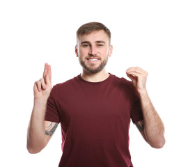 Fototapeta premium Man using sign language on white background