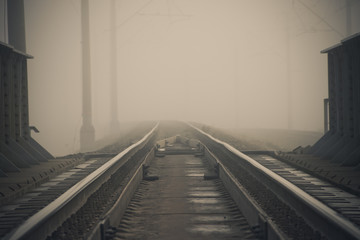 Obraz premium Fog on the railway. Foggy Russian railway. Morning fog.