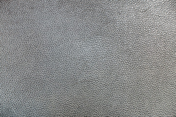 Grey colour new abstract rugged genuine leather background.