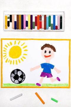 Colorful drawing: smiling boy playing football