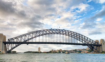 Fototapeta na wymiar Beautiful view of Sydney Harbor Bridge from cruise ship in Sydney Harbor