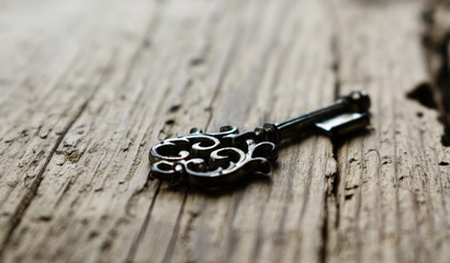 key on wooden background