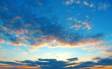 Beautiful sunset. The sky in the clouds.