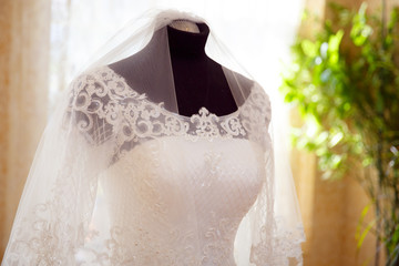 Fototapeta na wymiar Wedding dress at the Bride on the wedding day.