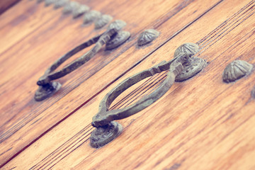 old zitouna mosque wooden door with metallic knocker