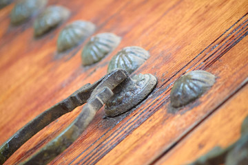 old zitouna mosque wooden door with metallic knocker
