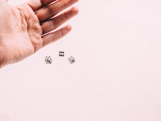 Classic play board game dices in hand. Toning