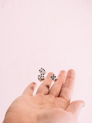 Classic play board game dices in hand. Toning