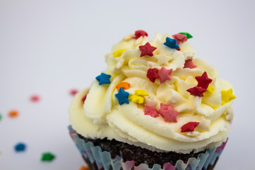 muffin. chocolate muffin, chocolate muffin with cream and berries, place for text