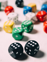 Color dices in hand. Board game casino risk luck