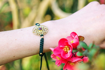 sacred geometry metal natural stone bracelet on female wrist