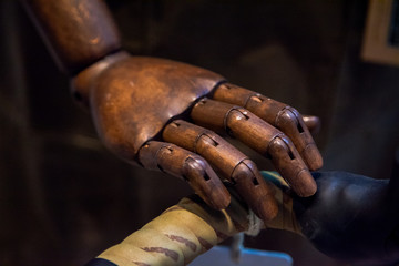 Obraz premium stylish wooden hand on a handle close up view