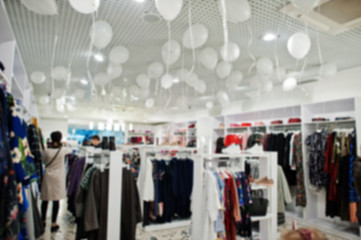 Blurred or defocused background of clothing store boutique.