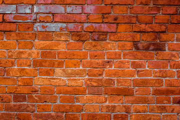 Vintage From Red To Orange Brick Wall Texture. Building Facade With Grunge Damaged