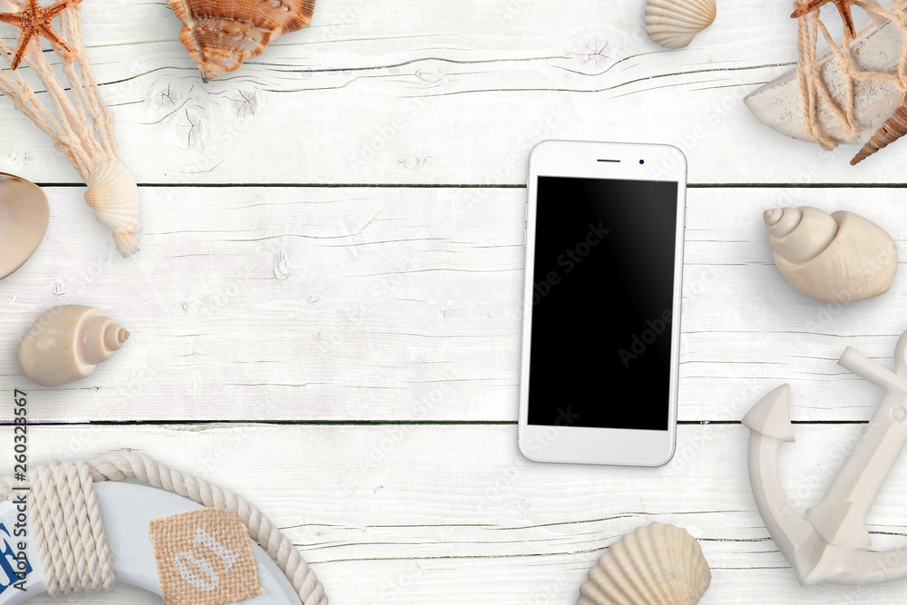 Poster mobile phone with blank screen for mockup on white wooden table surrounded with shells and sea ancho