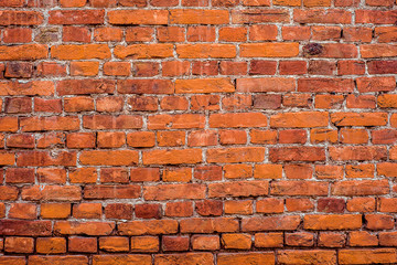 Vintage Red Brick Wall Texture. Building Facade With Grunge Damaged